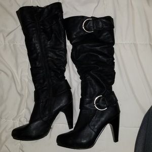 Black leather knee high boots